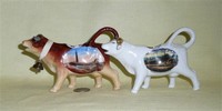 Souvenir cow creamers from Blackpool and Brighton