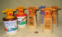 A bunch of Whirley moo-cow creamers