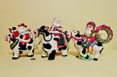 3 Santa cow teapots