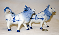  Two Delft cow creamers from similar molds, right