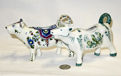 Two polychrome Delft cow creamers