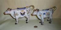 Two Renoleau souvenir cow creamers