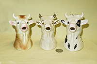 Three Coventry cow hear creamers