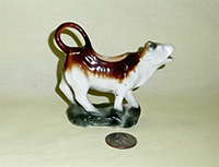 Cow creamer on a rock