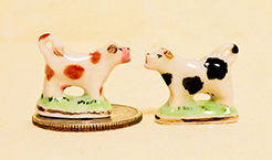 2 British porceialn cow creamers from a country fair