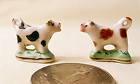 2 British porcelain miniature cow creamers