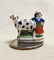 V&R cow and milkmaid spill vase