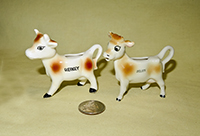 Guernsey and Jersey souvenir cow creamers