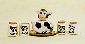 Miniature cow teapot and spice jars