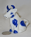 Blue and white sitting cow creamer