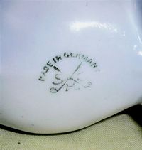 German cow creamer from one of my favorite molds, with Delft decorations, mark