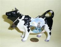 Black and white German cow creamer, souvenir of Stettin