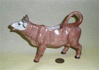 Szeged Porcellain brown cow creamer with white face