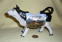 Black and white German cow creamer, souvenir of Ostseebad Grosmollen