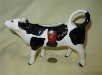 Black and white cow creamer from Gruyeres