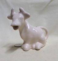 White Cookson's Pottery sitting up caricature cow creamer