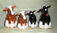 4 Enesco Border Fine Arts Sitting up cow creamners from UK