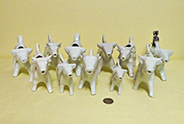 Group of white cow creamers