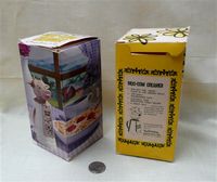 Two Moo Cow creamers in boxes