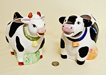   B&W cow creamers with decorations