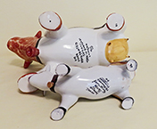 Bottom of those 2 Portuguese cow creamers