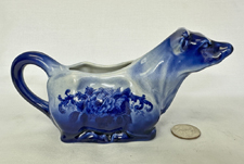 Empress kneeling cow creamer