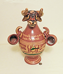 Large Mexican bull  jug with cups