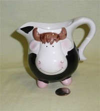 Smiley-faced cow pitcher