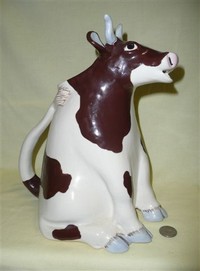 Brown and white 'Animals & Co' cow pitcher