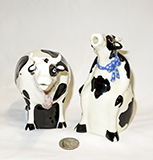 2 cow creamers by Tom Hatton