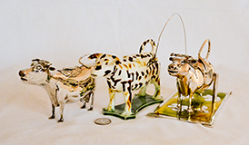 Schupe silver, old staffordshire, and Dalina silver cow creamers
