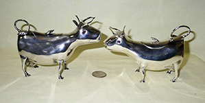 2 Dutch silver cow creamers by Herbert Hooijkaas