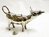 German silver cow with mouth spout, right