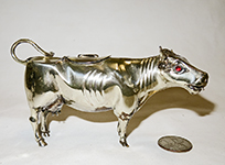 small realistic silver cow creamer