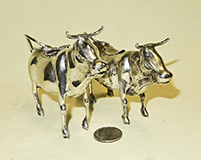 2 Coppini Italian silver cow creamers