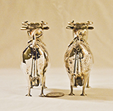 Two silver cow creamers by John Schuppe, butts
