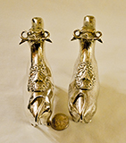 Two silver cow creamers by John Schuppe, top