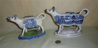 2 Blue Willow teransfer printed cow creamers, left