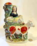 maid with cow spill vase