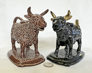 Brown & black Scottish Hignlands cow creamers