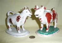 2 Utilitarian mid 19c cow creamers on bases
