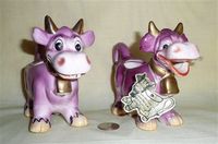 Purple cow with yellow horns creamer and sugar