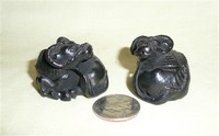 Two small
Japanese sleeping water buffalo suiteki