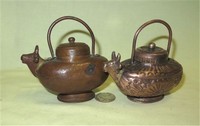 Two small Nandi water pots