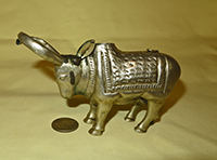 Nandi holy water pot pours through horns