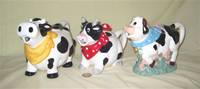3 Cow Teapots wearing bandanas