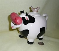 Chubby cow teapot with bulbous red nose