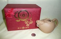 Modern Chinese clay water buffalo teapot and padded box