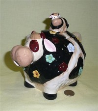 Lumpy cow decorative teapot