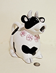 B&W Cow teapot with flower necklace